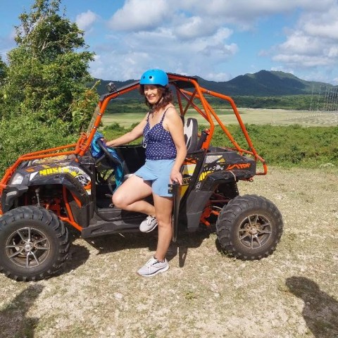 a man riding on the back of a truck